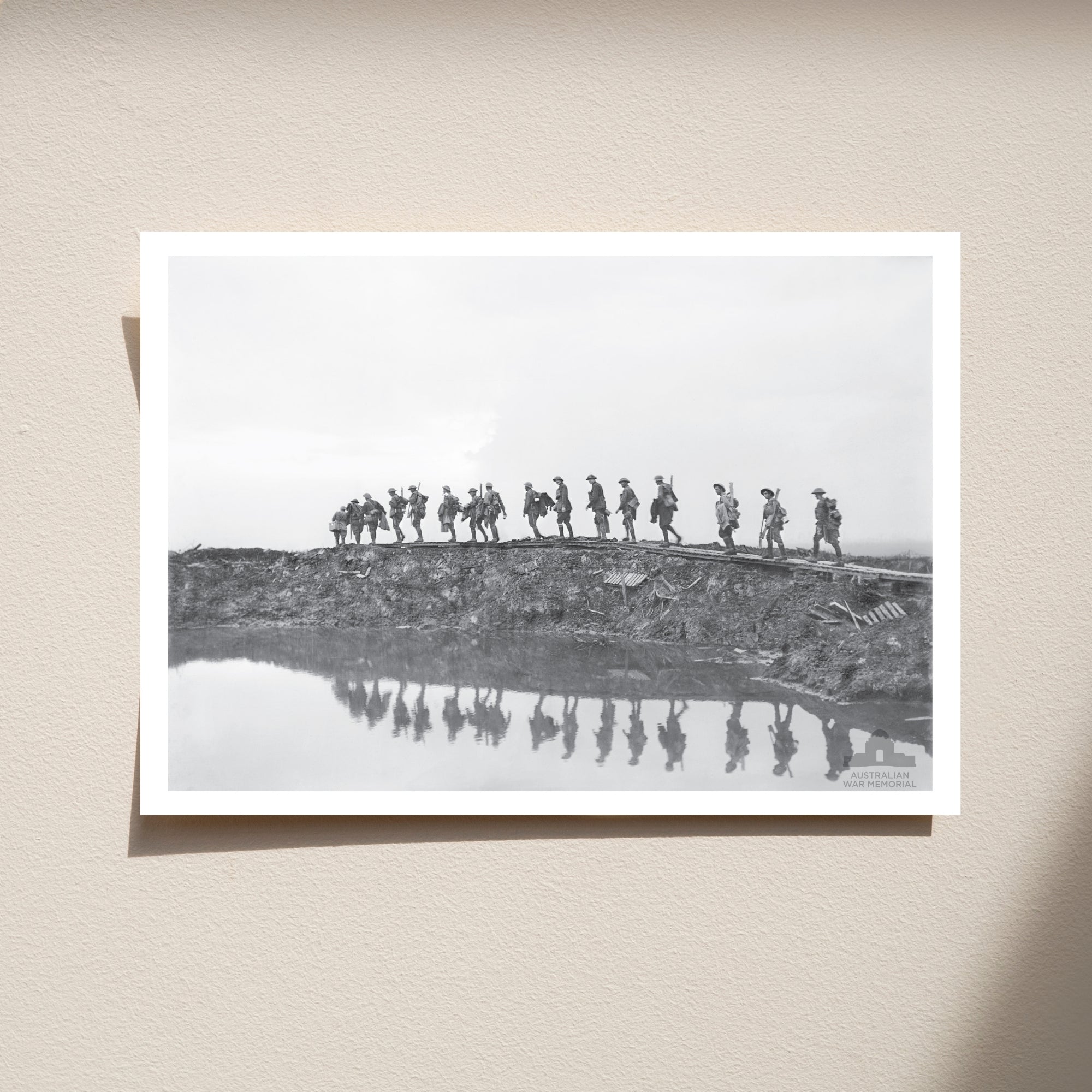 Postcard: 1st Australian Division walking on a duckboard track