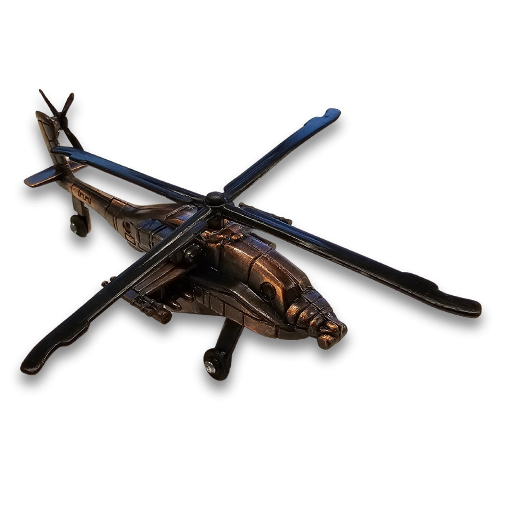Bronze helicopter figurine on a white background