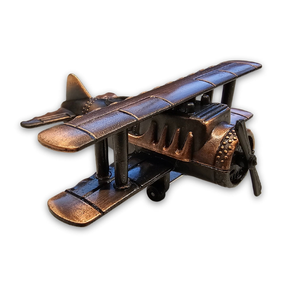 Bronze airplane model on a white background