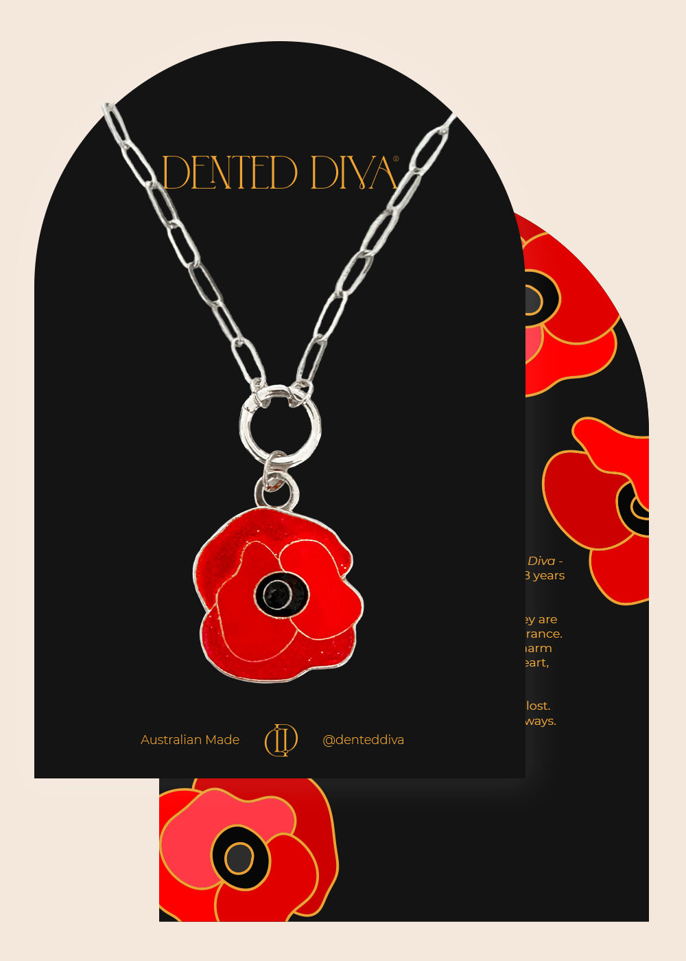 Silver necklace with a red poppy pendant on a black card with 'Dented Diva' branding.