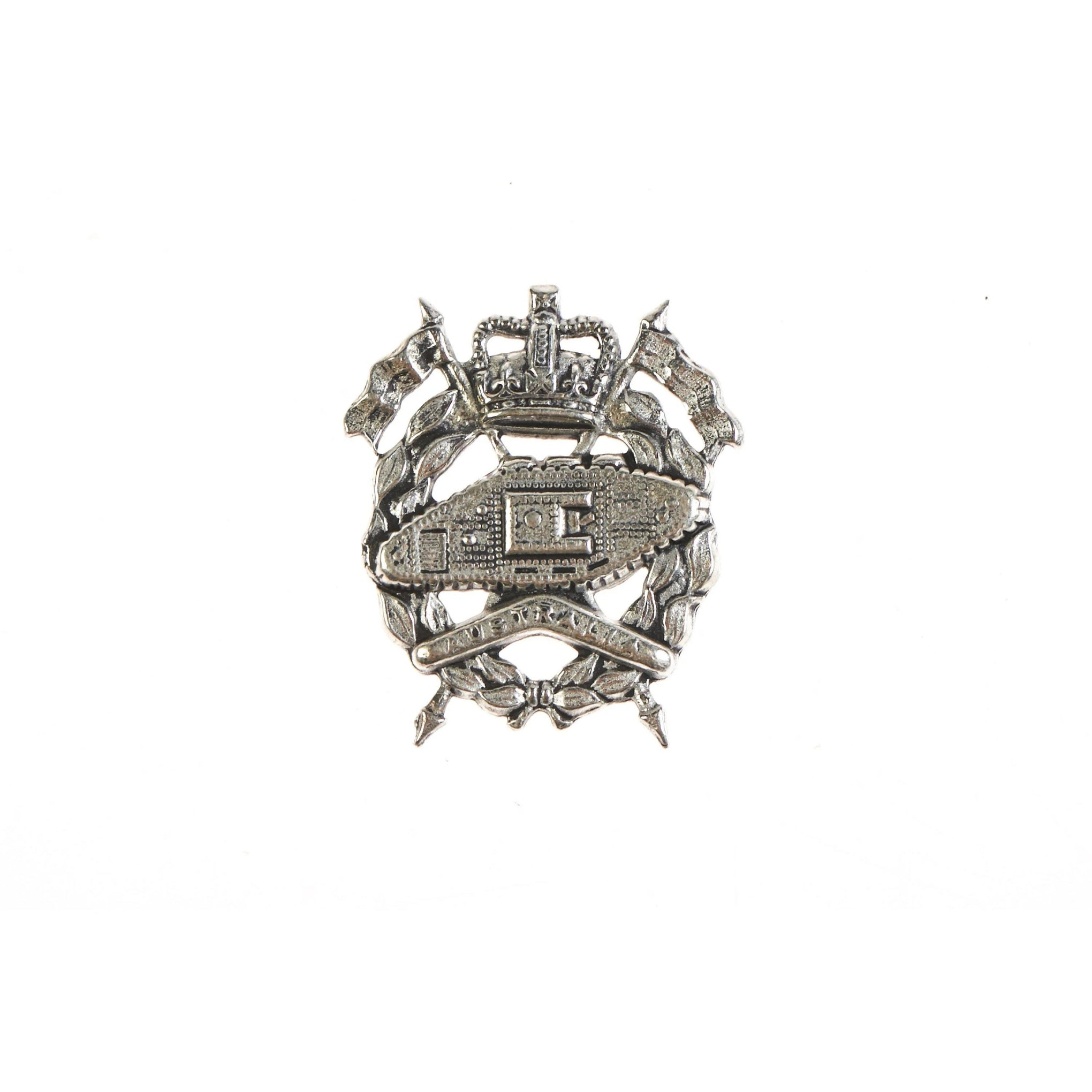 Silver-toned military badge for the 1st Armoured Corps Lapel Pin, featuring a wreath topped with crossed flags and crown. A tank and boomerang lie at the centre of the wreath.