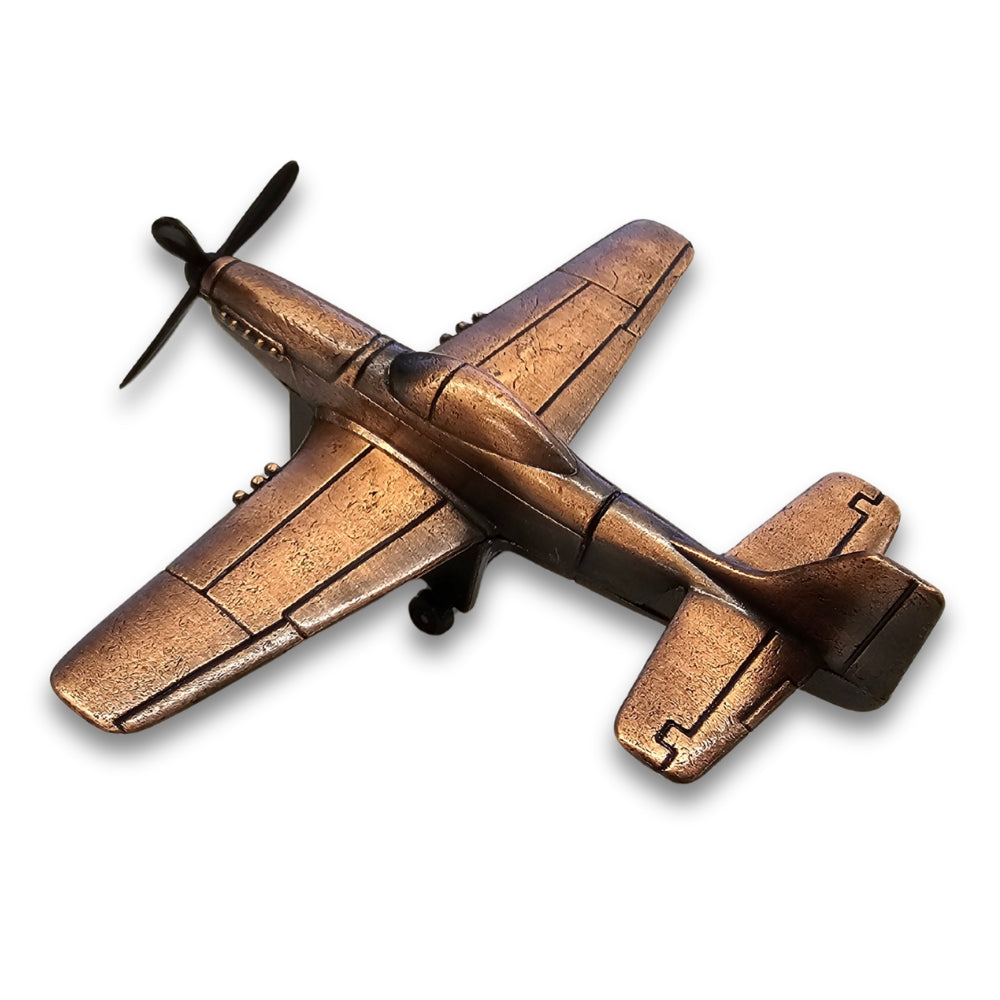 Bronze airplane model on a white background