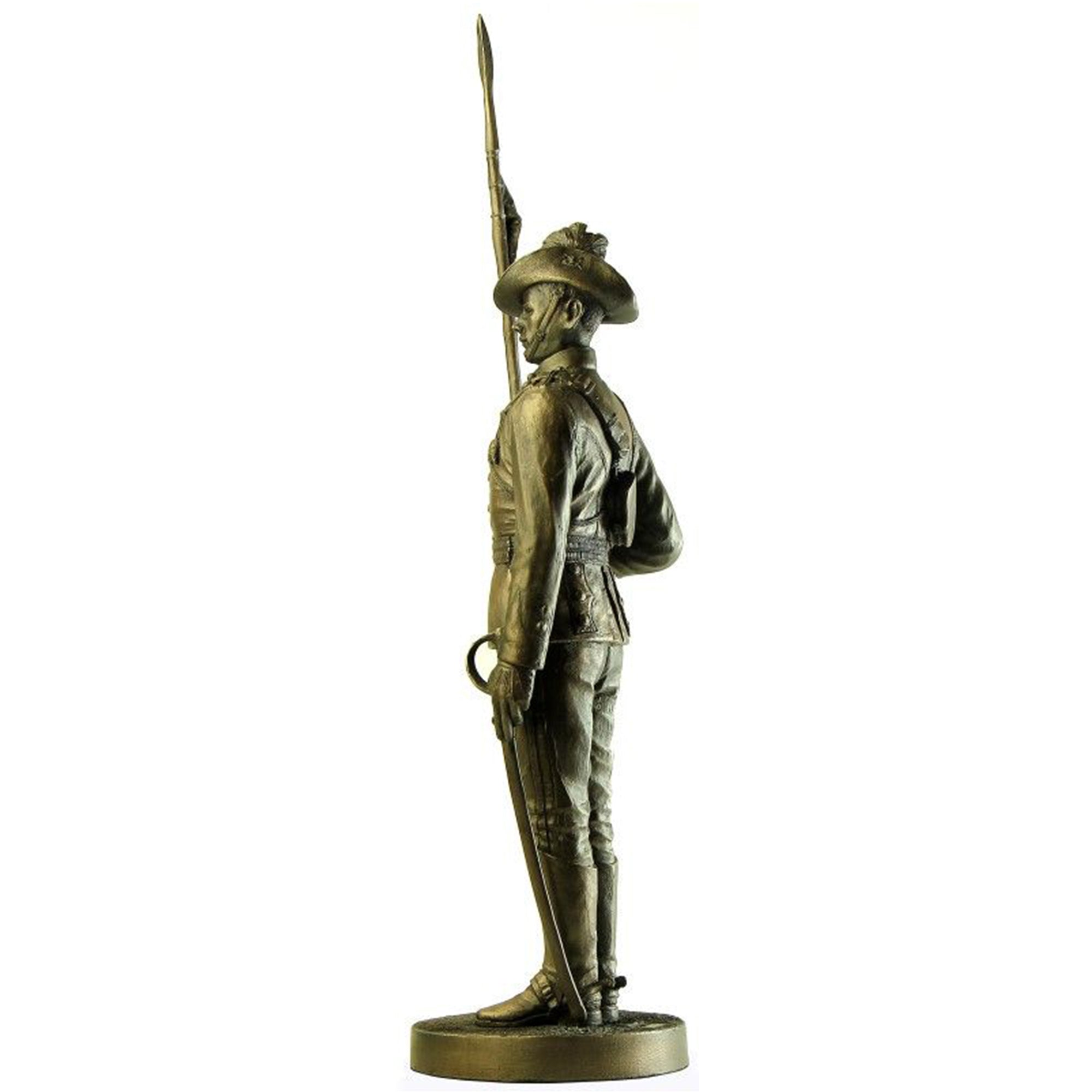 Bronze statue of a soldier holding a rifle on a white background