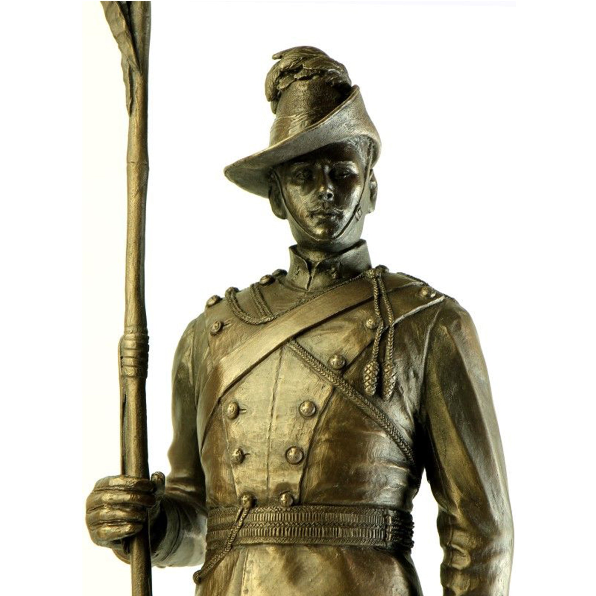 Bronze statue of a soldier holding a spear on a white background