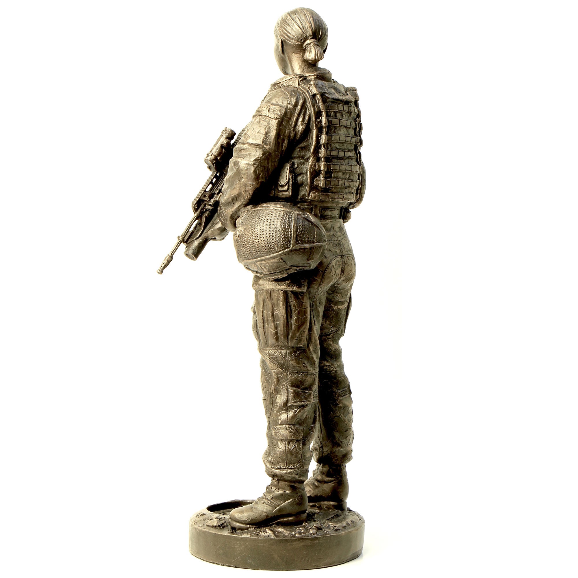 Bronze statue of a soldier holding a rifle on a white background