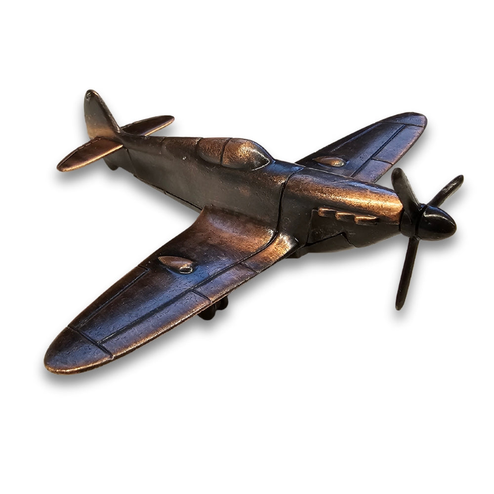 Bronze airplane model on a white background