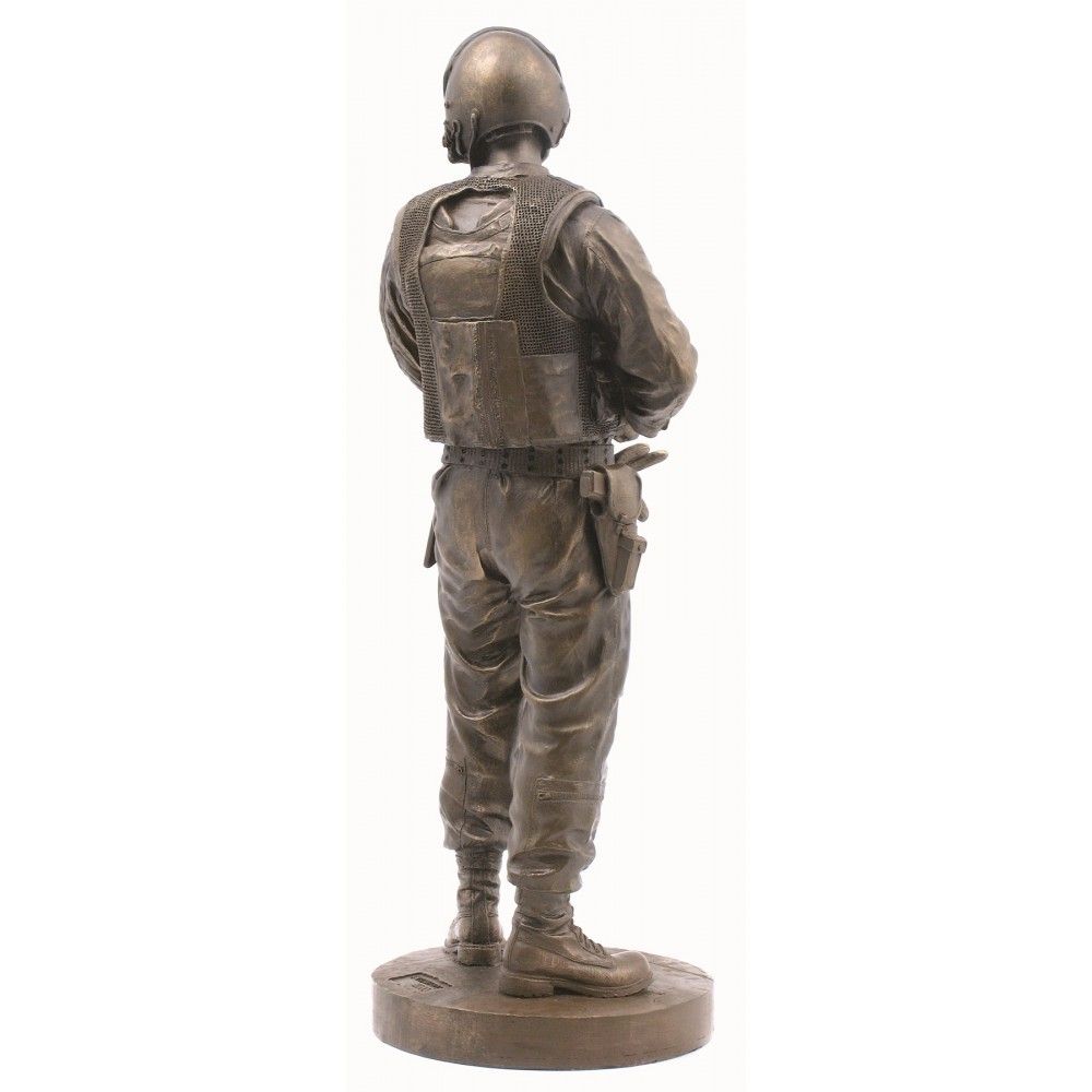 Bronze statue of a soldier on a white background