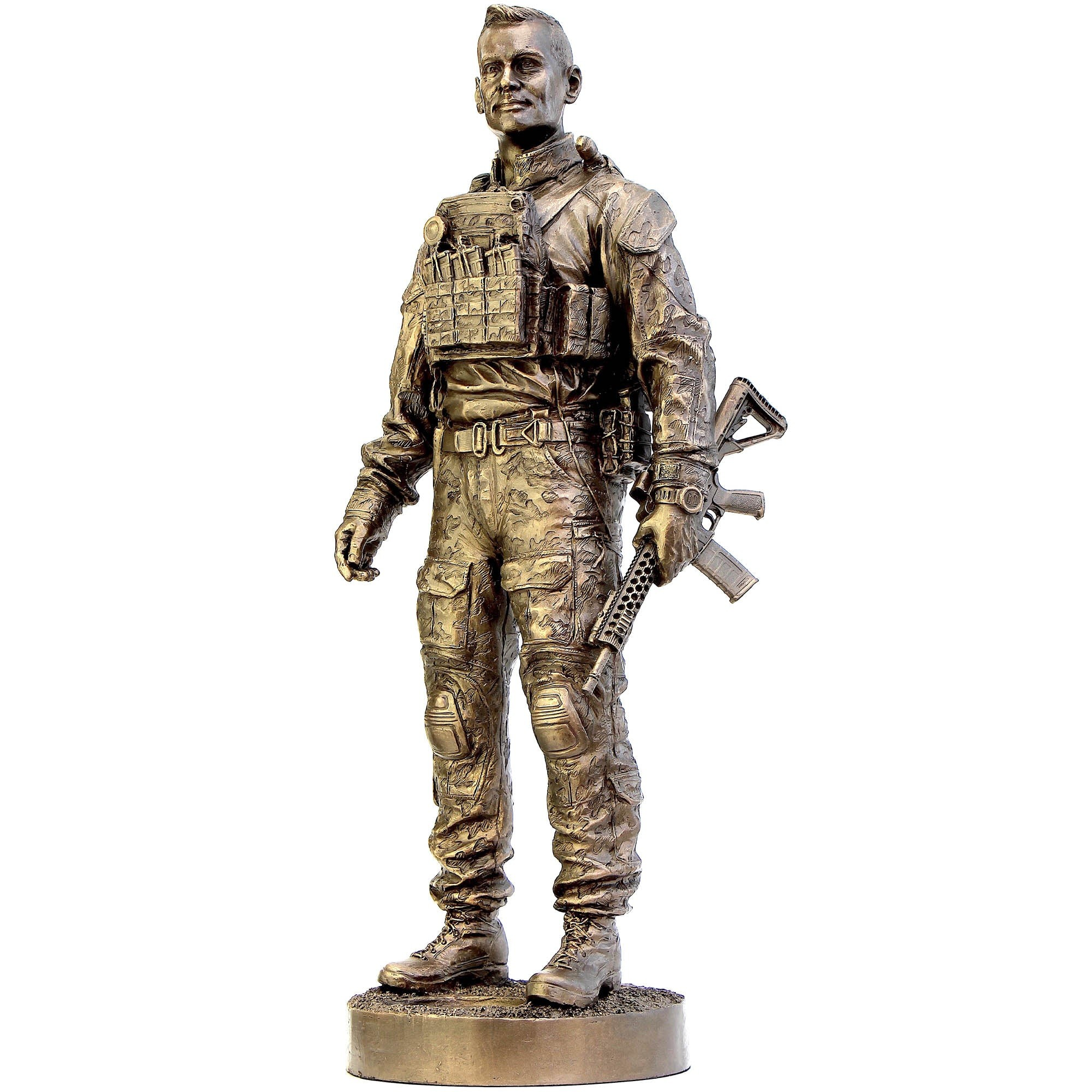 Bronze statue of a soldier holding a rifle on a white background
