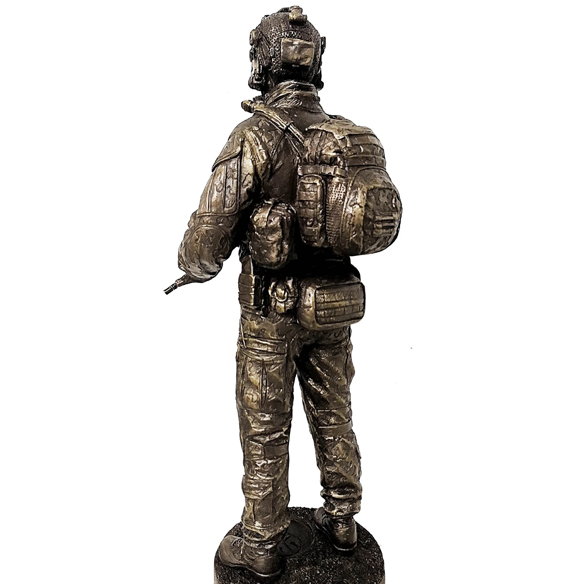 Bronze statue of a person in tactical gear on a white background