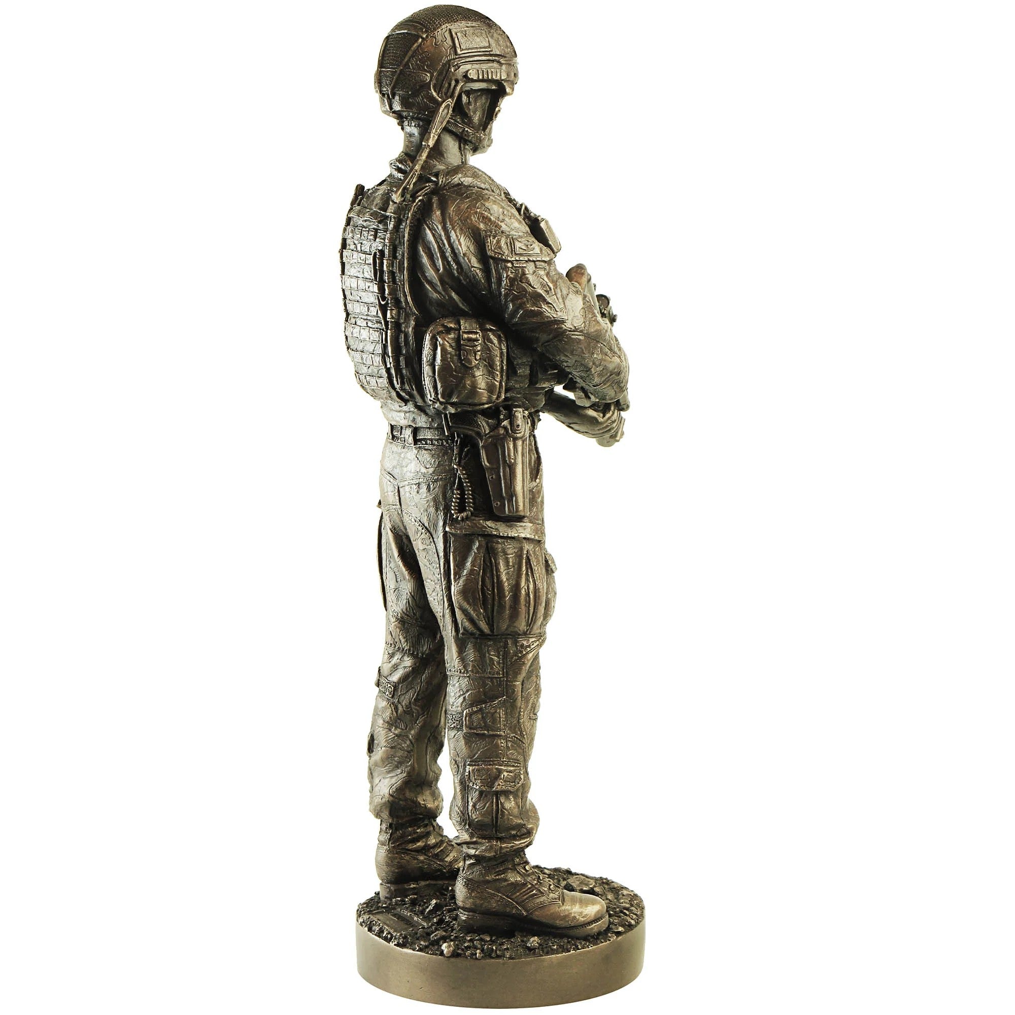 Bronze statue of a soldier holding a rifle on a white background