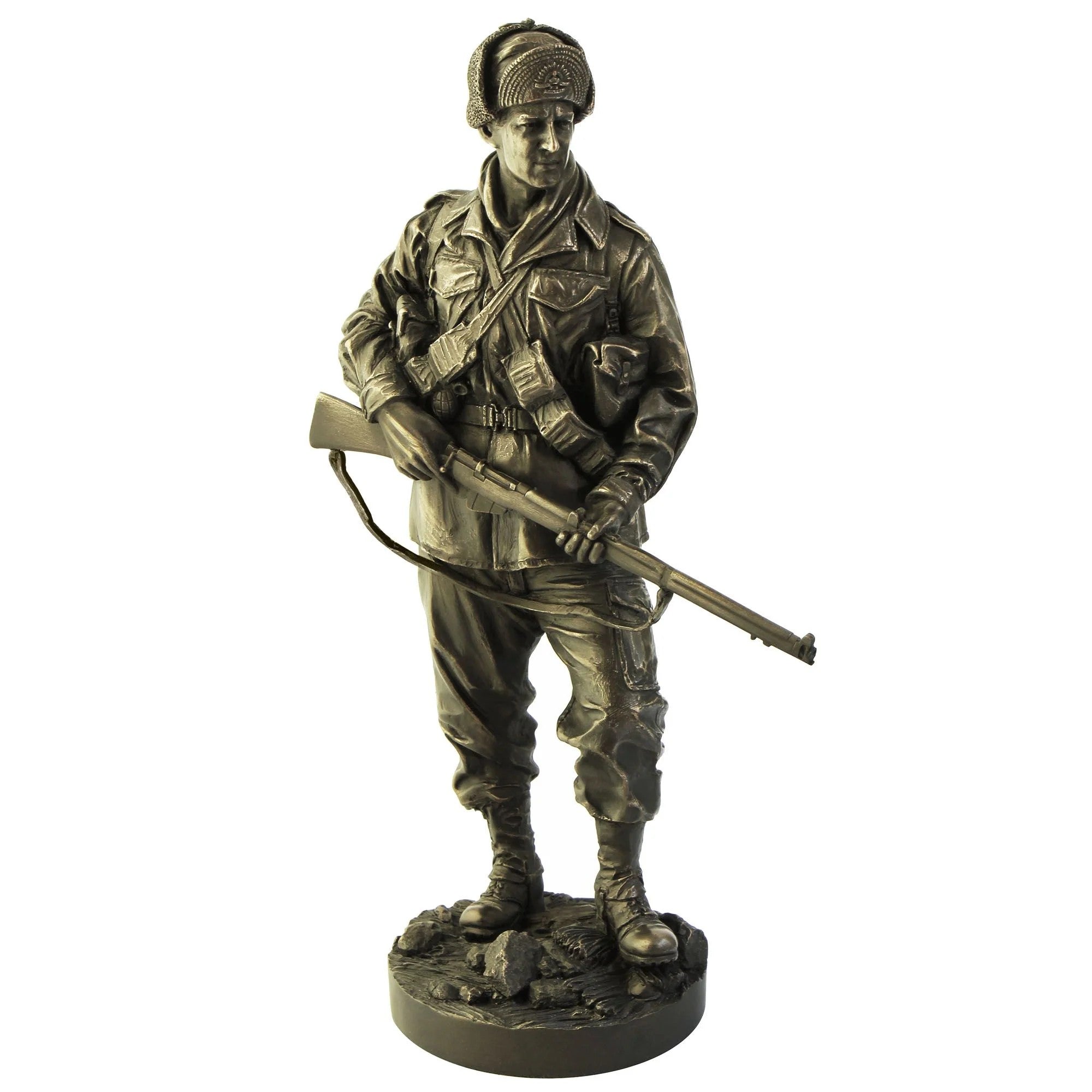 Bronze statue of a soldier holding a rifle on a white background